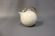 White glazed stoneware teapot with bast handle from Saxbo.
5000m2 showroom.