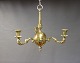 Small three-armed chandelier in brass from 1940.
5000m2 showroom.