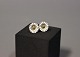 Daisy earrings in 925 sterling silver and enamel by A. Michelsen. 
5000m2 showroom.