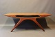 Coffee table, "The smile" in teak by Johannes Andersen and CFC Silkeborg from 
the 1960s.
5000m2 showroom.