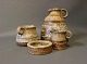 Stoneware service in brown colors consisting of - Jug, Cream jug, Sugar bowl & 
Smaller bowl by unknown artist.
Great condition
