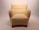 Easy chair from around the 1930s, newly upholstered with sheep wool.
5000m2 showroom.