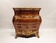 Rococo styled chest of drawers of walnut from Denmark around the year 1880.
5000m2 showroom.