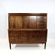 Secretary in rosewood of danish design from the 1960s.
5000m2 showroom.