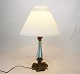 French table lamp of bronze and opaline glass from around the year 1910.
5000m2 showroom.
