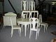 white painted livingroom. 
Table with extension 3 plates