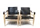 A pair of Safari Chairs - Black Grain Leather - Soap-Treated Beech - Aage Bruun 
& Son - 1960
