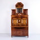 Empire secretary desk in hand-polished mahogany with marquetry, mirror, hidden compartment and writing flap from the 1840s.