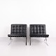 Pair of Ludwig Mies van der Rohe Barcelona Chairs in Black Leather by KnollStudio